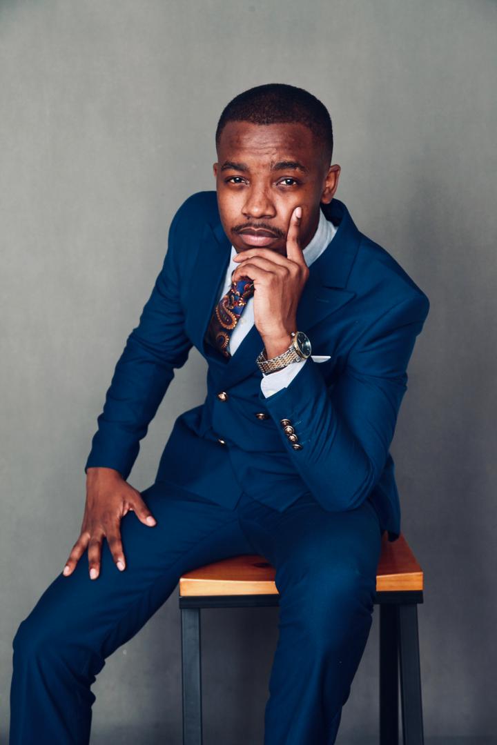 Dr. Pascal Kwangwari in professional attire